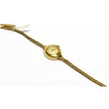 HELVETIA, A LADY'S SWISS 9CT GOLD SMALL ROUND BRACELET WATCH, CIRCA 1961 cream dial with raised gilt