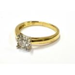 A MODERN DIAMOND SOLITAIRE RING the round brilliant approx. 0.50cts, in a white illusion-claw