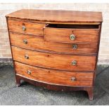 A BOWFRONT CHEST OF TWO SHORT AND THREE LONG DRAWERS on splayed bracket feet, 108cm wide