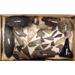 A COLLECTION OF PREHISTORIC WORKED FLINT ARROW HEADS & TOOL BLADES (approximately 30); together with