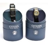 CITIZEN, ECO DRIVE, A LADY'S STAINLESS STEEL AND GILT BRACELET WATCH AND A GENTLEMAN'S STAINLESS