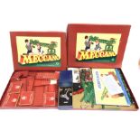 A MECCANO COLLECTION in No.4 and No.3 boxes; together with a Merit Derby horse-racing game, boxed.