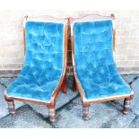 A PAIR OF EDWARDIAN MANOGANY FRAMED SIDE CHAIRS with line inlaid decoration and button upholstery,