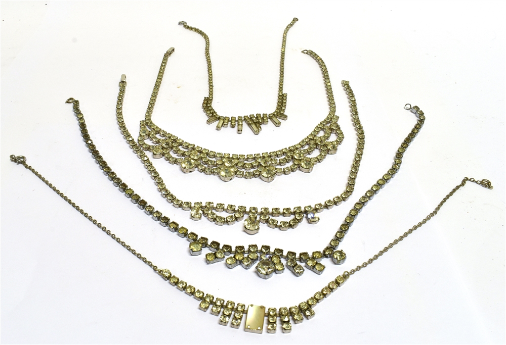 A COLLECTION OF MOSTLY VINTAGE AND MODERN COSTUME JEWELLERY to include five near-colourless paste