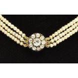 A LATE VICTORIAN PEARL THREE-ROW NECKLACE ON A DIAMOND CLUSTER CLASP the rows of 155, 152 and 162