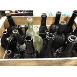BREWERIANA - A COLLECTION OF 19TH CENTURY DARK OLIVE-GREEN WINE & GIN BOTTLES mostly with 'kick-