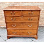 A MAHOGANY CHEST OF TWO SHORT AND THREE LONG DRAWERS on bracket feet, 97cm wide