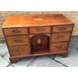 A MAHOGANY SIDE CABINET with crossbanded and inlaid decoration, fitted with three drawers above