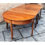 A LARGE 19TH CENTURY MAHOGANY DINING TABLE with central drop-leaf section, pair of D-ends and two