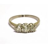 A MID-20TH CENTURY OLD-CUT DIAMOND THREE STONE RING the graduated old-cut stones approx. 0.72cts