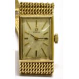 OMEGA, A LADY'S 9CT GOLD RECTANGULAR BRACELET WATCH, CIRCA 1969 brushed-silvered dial with raised
