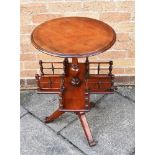 A VICTORIAN MAHOGANY TRIPOD OCCASIONAL TABLE the circular top 46cm diameter, with revolving