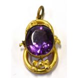 A VICTORIAN GOLD AND AMETHYST PENDANT ADAPTED FROM A BRACELET centred with an oval mixed-cut