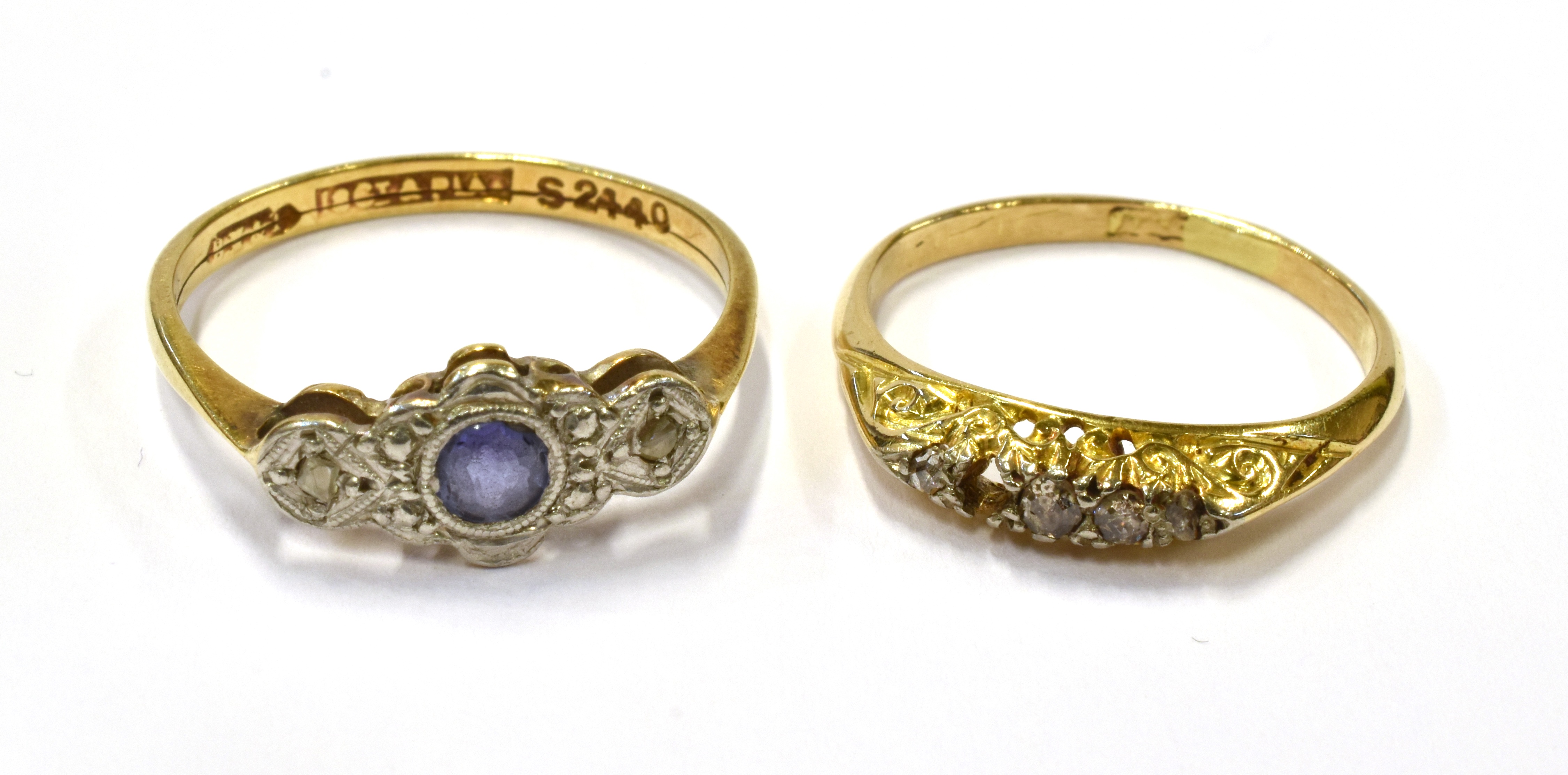 TWO EARLY 20TH CENTURY GOLD AND GEM RINGS INCLUDING AN ART DECO GOLD, SAPPHIRE AND DIAMOND THREE