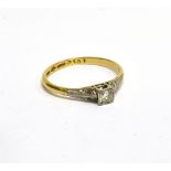 AN EARLY-MID 20TH CENTURY GOLD AND DIAMOND SOLITAIRE RING the round brilliant approx. 0.15cts, grain