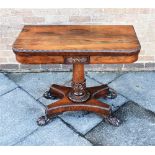 A 19TH CENTURY ROSEWOOD CARD TABLE the pillar support with acanthus carved decoration on