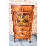 A CONTINENTAL GILT METAL MOUNTED SECRETAIRE A ABBATANT with serpentine front and shaped sides,