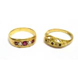 TWO GOLD AND GEM SET GYPSY RINGS comprising; an early 20th century small ruby and half-pearl five