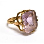 A VINTAGE GOLD AND CUSHION-SHAPED AMETHYST SINGLE STONE RING the amethyst possibly a seal or