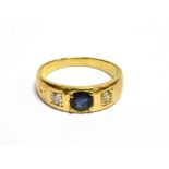 A VICTORIAN GOLD, SAPPHIRE AND DIAMOND THREE STONE GYPSY RING centred with a later round mixed-cut