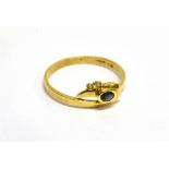 A MODERN ITALIAN 18CT GOLD, SMALL SAPPHIRE AND DIAMOND THREE STONE RING the small round sapphire and