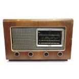 THREE RADIOS comprising an Ecko Model A.104 radio, with a polished wood case (working); Bush Type