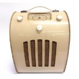 THREE RADIOS comprising an Ever Ready Model C All-Dry Portable Octal Valve Radio, with a cream