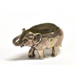 AN EARLY 20TH CENTURY NOVELTY SILVER PIN CUSHION by Levi Salaman, Birmingham 1904, in the form of