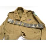 ASSORTED MILITARIA comprising three Royal Army Educational Corps 1949 Pattern battledress blouses,