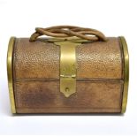 A LATE 19TH CENTURY CASKET TYPE SEWING PURSE of brown leather and gilt metal construction, the lid