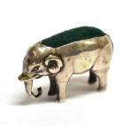 AN EARLY 20TH CENTURY NOVELTY SILVER PIN CUSHION in the form of a miniature bull elephant, marks