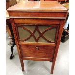 AN H.M.V. OAK CABINET GRAMOPHONE with an H.M.V. No.5A reproducer, 87cm high.