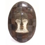 TRIBAL ART - A SONGYE (CONGOLESE) PARRYING SHIELD with kifwebe mask to the centre, the reverse