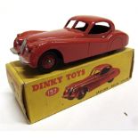 A DINKY NO.157, JAGUAR XK120 COUPE red with matching ridged hubs, excellent condition (with minor