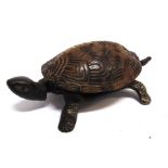 A LATE 19TH CENTURY CAST IRON NOVELTY CLOCKWORK TABLE BELL in the form of a tortoise, with a two-