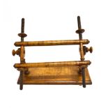 A LATE 18TH OR EARLY 19TH CENTURY EMBROIDERY TABLE STAND of turned wooden construction, on a