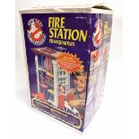 A KENNER GHOSTBUSTERS FIRE STATION HEADQUARTERS with unused sticker sheet, ghost trap and