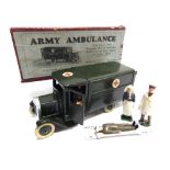 A BRITAINS NO.1512, ARMY AMBULANCE dark green, excellent condition, complete with driver and wounded