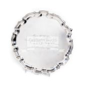 A sterling silver salver presented to the racehorse trainer Dick Hern,