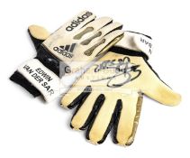 A pair of signed Edwin Van Der Sar gaolkeeping gloves, both palms signed in black marker pen,