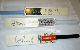 Six mini-bats signed by the England cricketing greats & group of three leather cricket balls signed