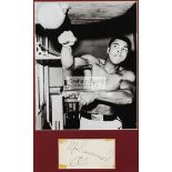 Muhammad Ali signed framed photographic presentation, a 10 by 8in.
