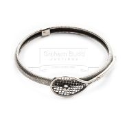 A Victorian silver Tennis Racket bangle, circa 1880, with tilt head design, silver tested,