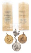 A trio of 1930 World Cup commemorative medals, in gold-plate, silver & bronze,
