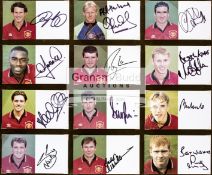 A pair of framed sets of autographed Manchester United player photographic cards,