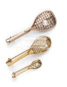 Three Victorian 9ct gold Tennis Racquet Brooches, circa 1890-1900,