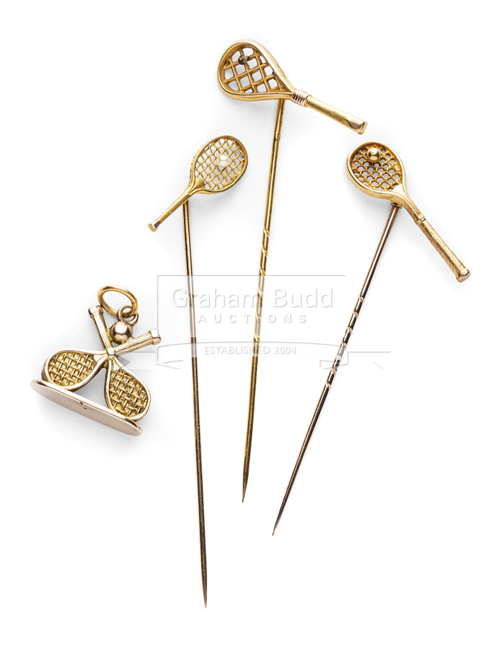 Three Victorian 9ct gold tennis racquet tie-pins, circa 1890-1900,