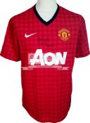 Sir Alex Ferguson signed Manchester United home jersey.