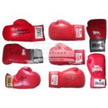 Eight signed Boxing Gloves, comprising: Jake La Motta, David Haye, Roberto Duran, Thomas Hearns,