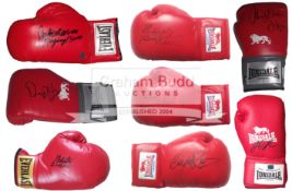 Eight signed Boxing Gloves, comprising: Jake La Motta, David Haye, Roberto Duran, Thomas Hearns,